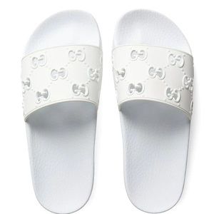 White Gucci slides. Size 7, brand new in box.